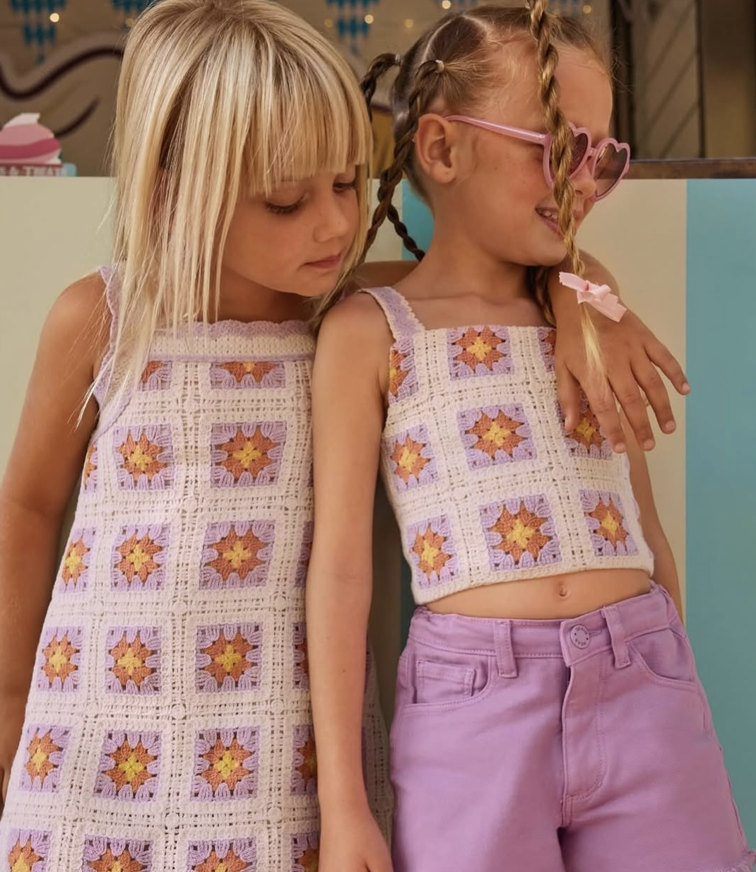 Two girls in crochet summer fashion looks.